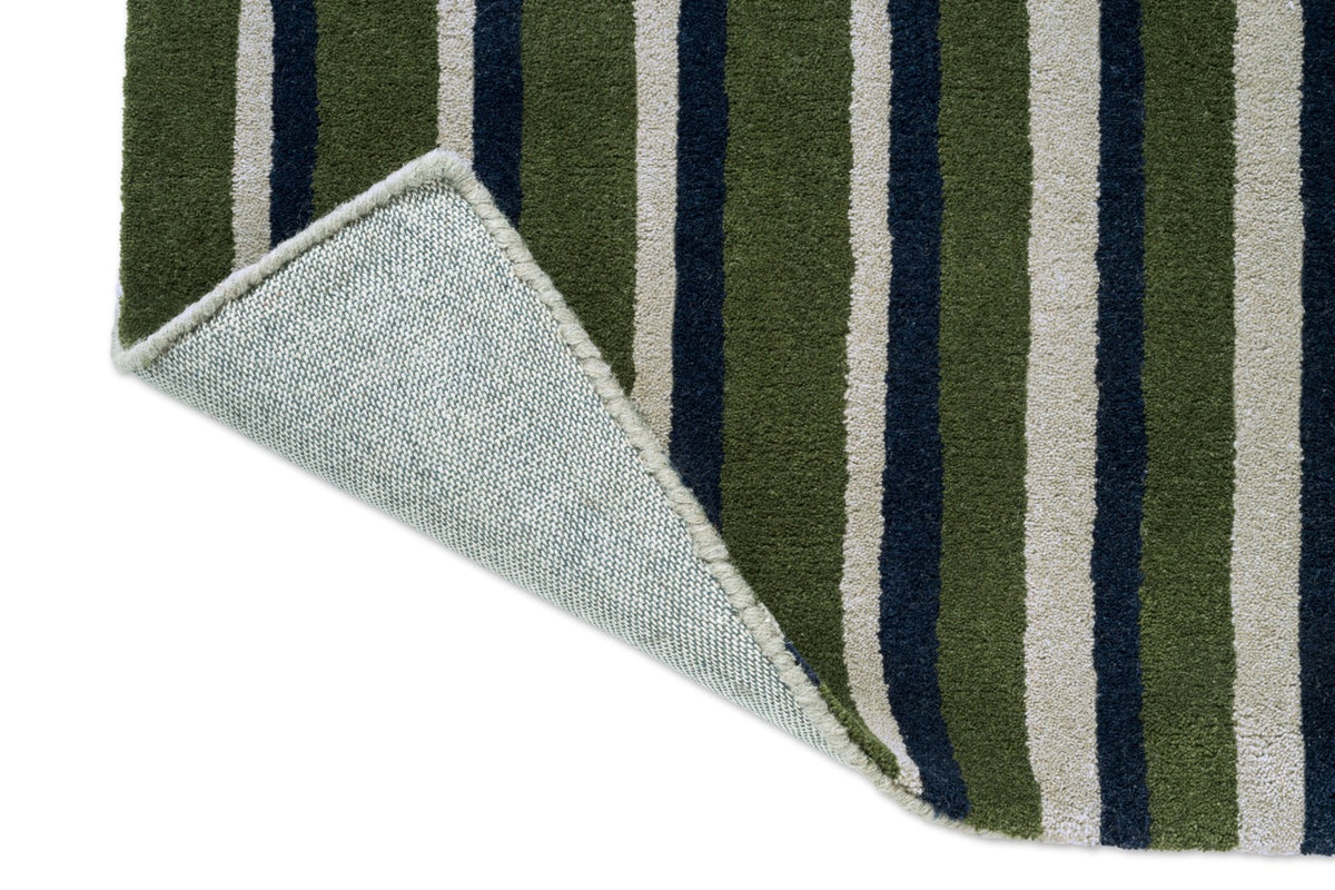 Tapis Brink & Campman Decor Pilar Moss, détail de l'angle replié et du dos