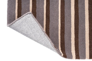 Brink & Campman Decor Pilar Taupe tapijt, detail van omgeslagen hoek en rug