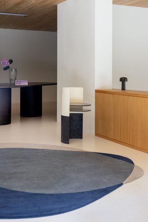 Brink & Campman Element Arp Blue rug styled in modern minimalist living room