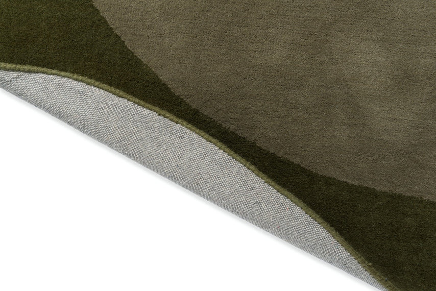 Detail edge of Brink & Campman Moore Moss hand-tufted organic rug