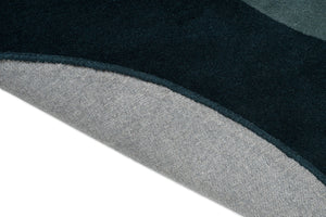 Brink & Campman Element Lane Blue tapijt, detail van omgeslagen rand en rug