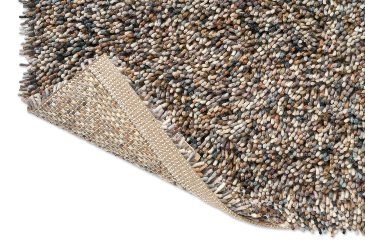 Brink & Campman Loom Natural Storm tapijt, detail van omgeslagen hoek en rug