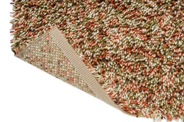 Brink & Campman Loom Pumpkin tapijt, detail van omgeslagen hoek en rug