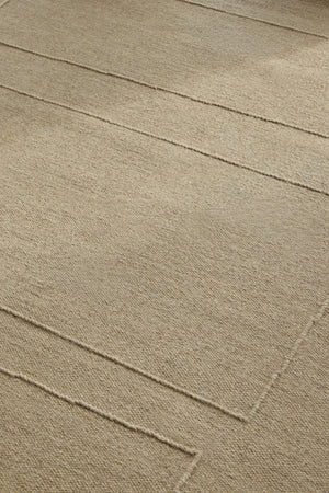 Brink & Campman Senso Blocks Natural tapijt in zandbeige met drie blokken in reliëf, in een interieur, tweede beeld