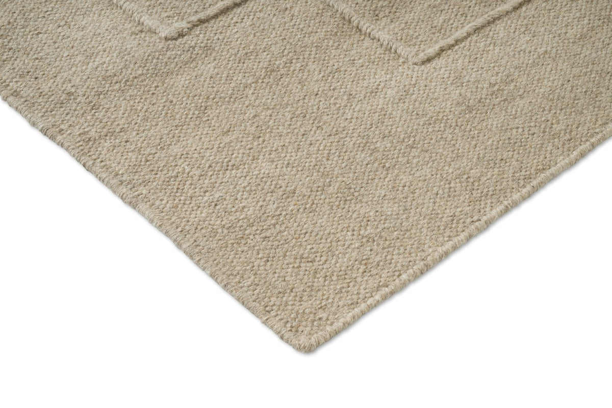 Brink & Campman Senso Level Natural tapijt, detail van hoek en weefsel