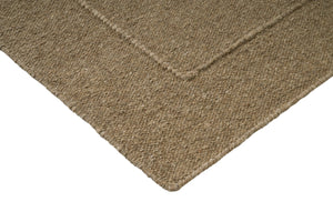 Brink & Campman Senso Planes Fur Brown tapijt, detail van hoek en weefsel