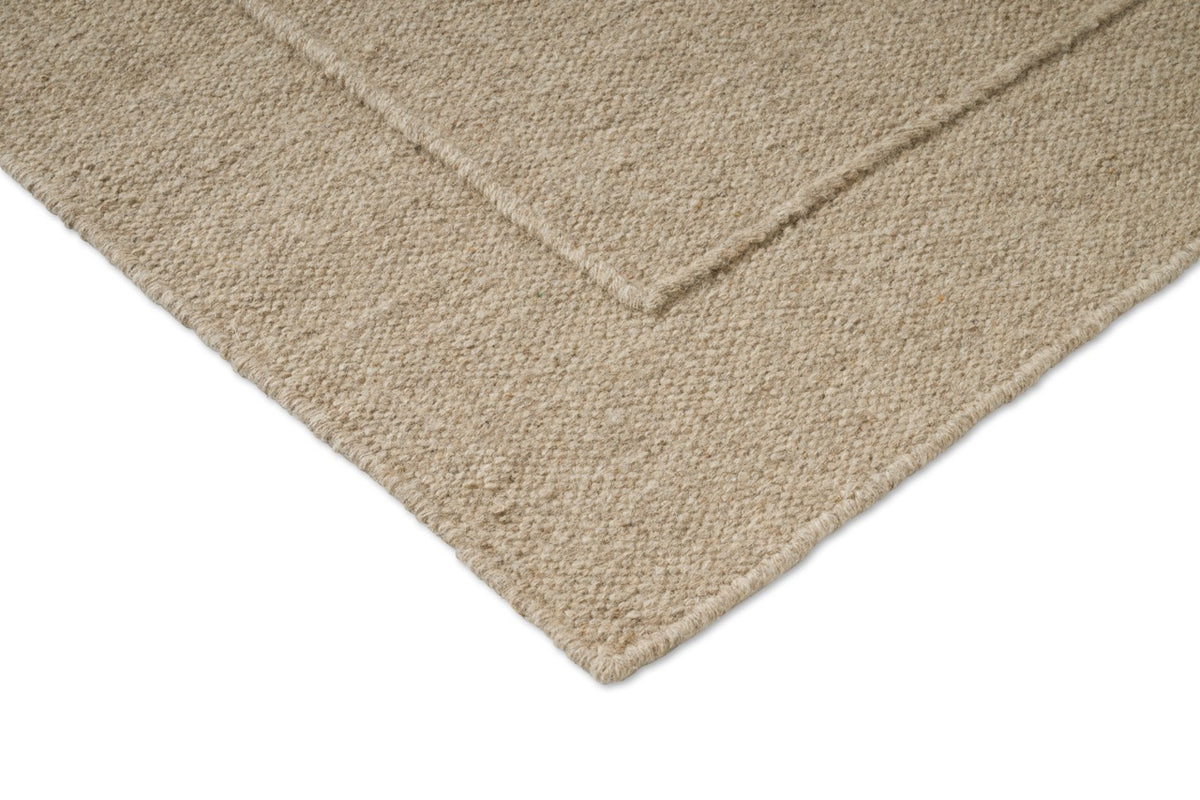 Brink & Campman Senso Planes Natural tapijt, detail van hoek en weefsel