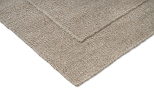 Brink & Campman Senso Planes Soft Taupe tapijt, detail van hoek en weefsel