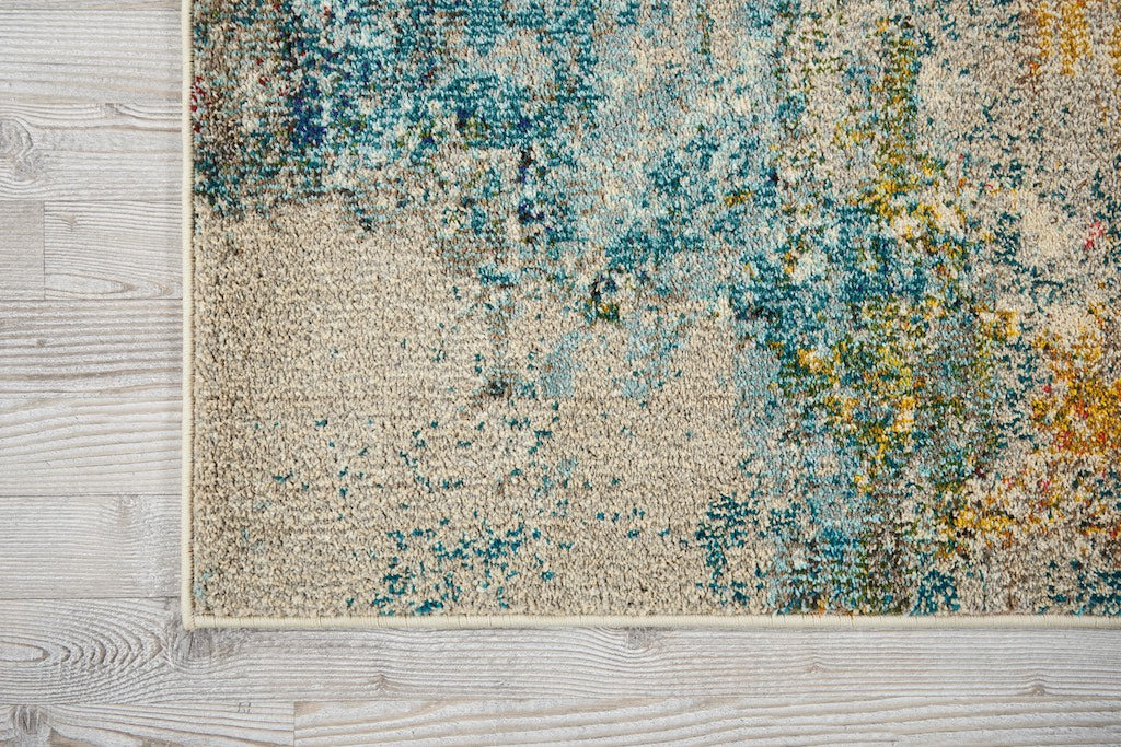 Detail edge of Nourison Celestial Sealife woven synthetic rug