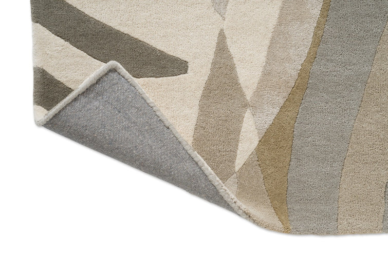 Tapis Harlequin Atelier Pebble, détail de l'angle replié et du dos