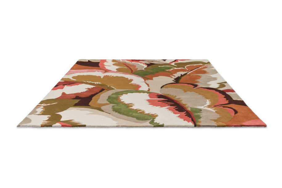 Harlequin Calathea Amber rug top view - multicolor floral pattern in rosewood tones