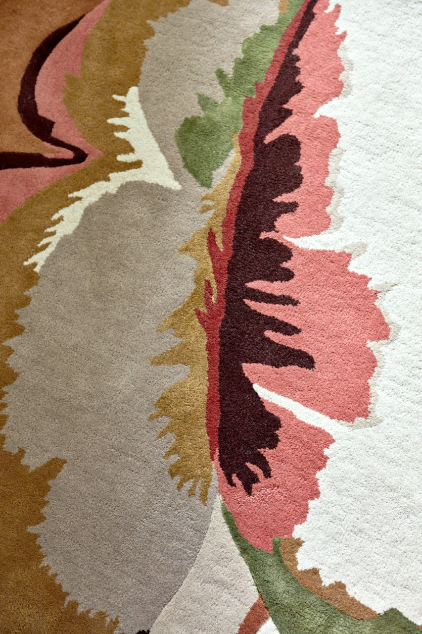 Close-up texture of Harlequin Calathea Amber wool-viscose rug showing hand-tufted quality