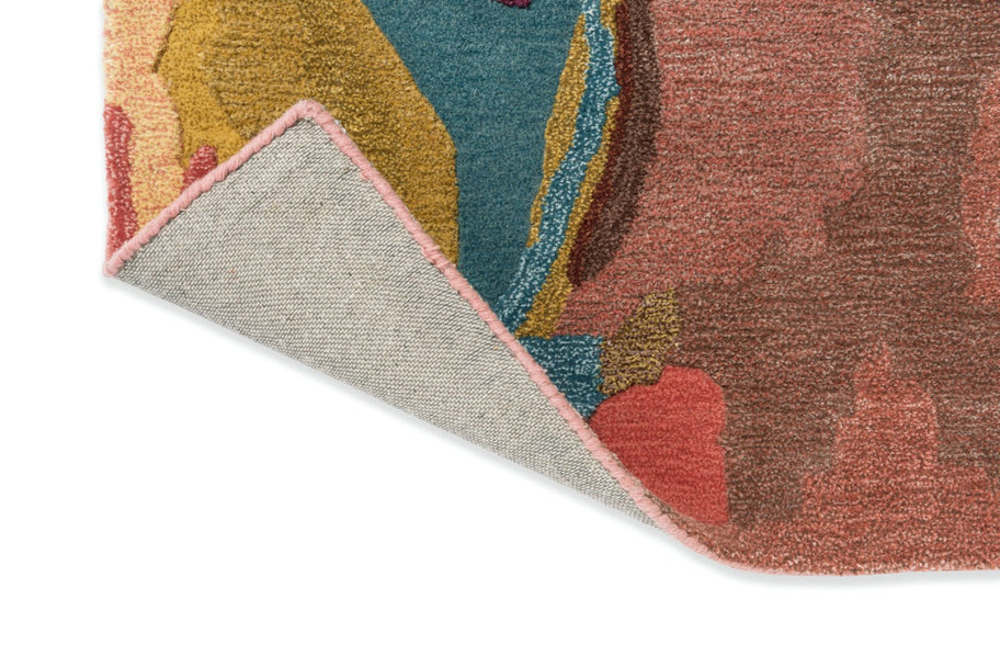 Detail edge of Harlequin Foresta Rosewood hand-tufted wool-viscose rug