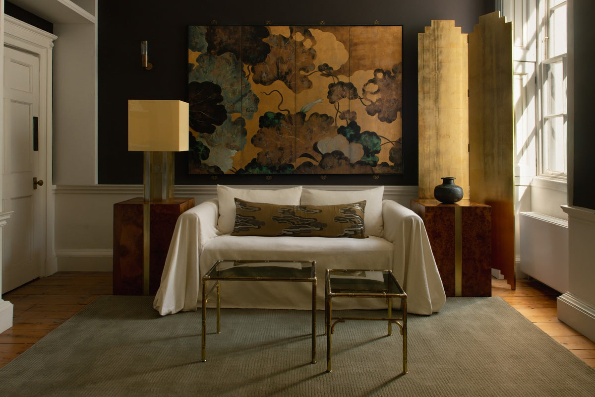 Layered Drift Wool Olive olive green wool rug, in a living room