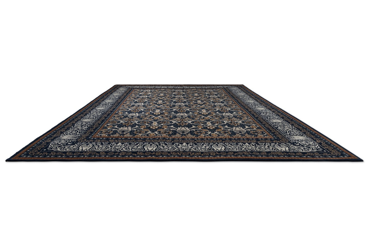 Morris & Co Borage Blue rug in indigo, ivory and caramel, perspective view