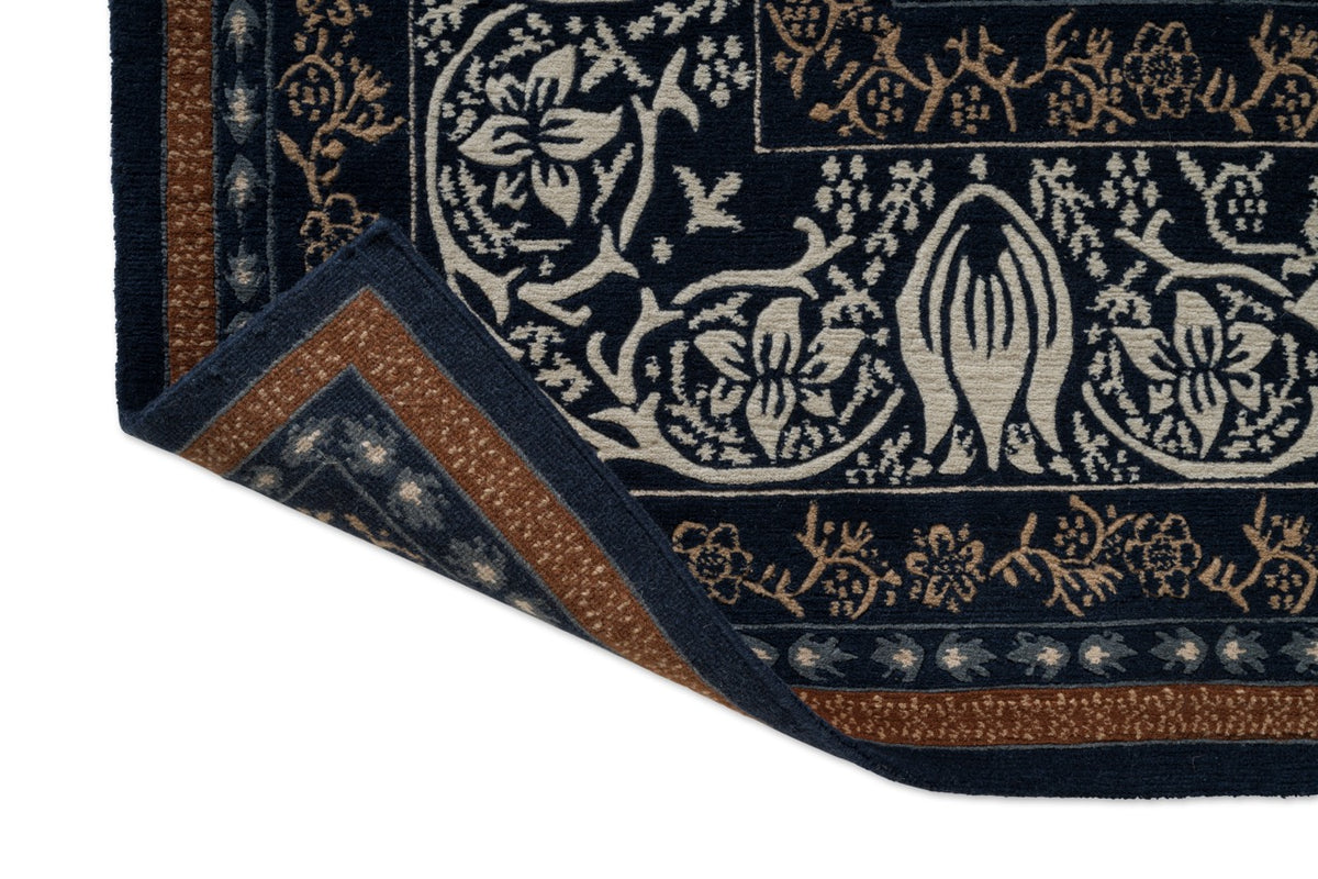 Morris & Co Borage Blue rug, detail of folded corner and backing