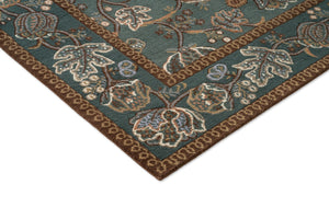 Morris & Co Theodosia Bottle Green rug, detail of corner and pile