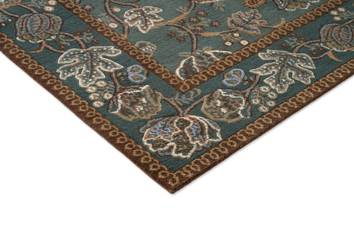 Morris & Co Theodosia Bottle Green rug, detail of corner and pile