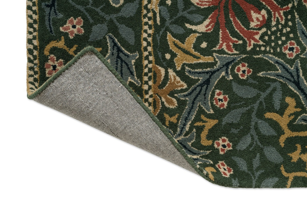 Morris & Co Walthamstow Forest Teal rug, detail of folded corner and backing