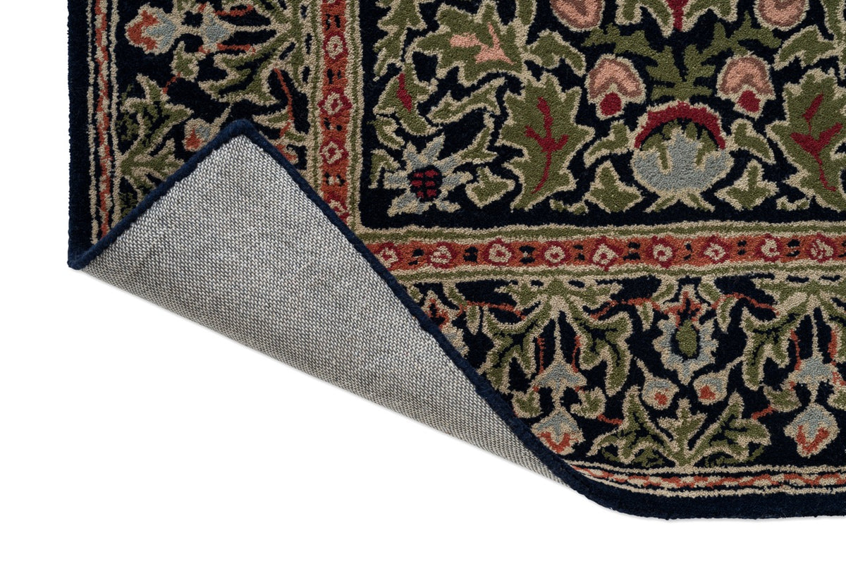 Morris & Co Wilton Weave Indigo rug, detail of folded corner and backing