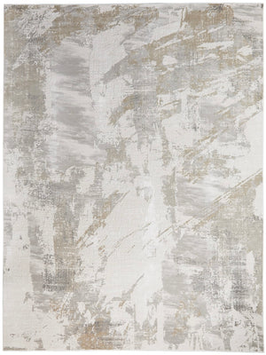 Abstract patterned rug with neutral colors on a white background