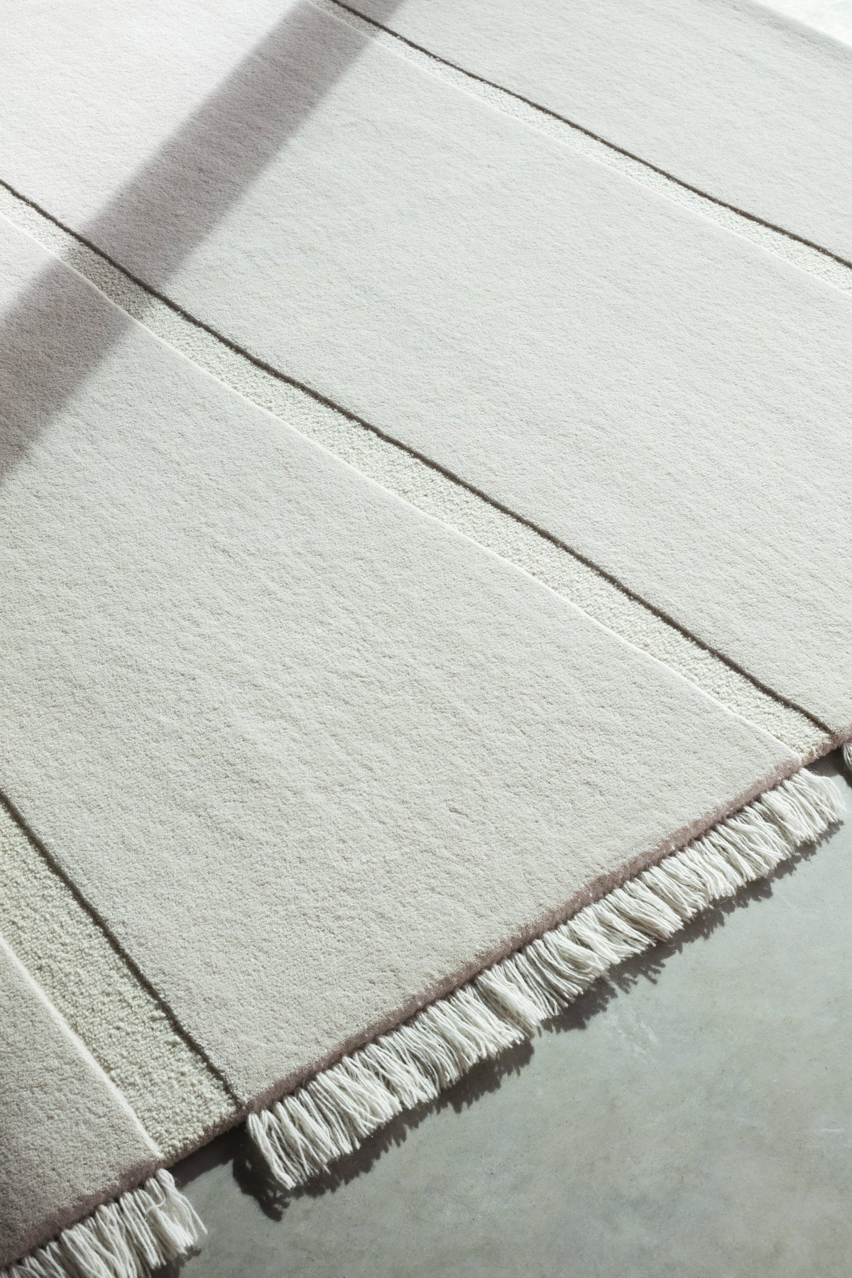 Massimo Atoll Cream handgetuft vloerkleed, detail van de hoek