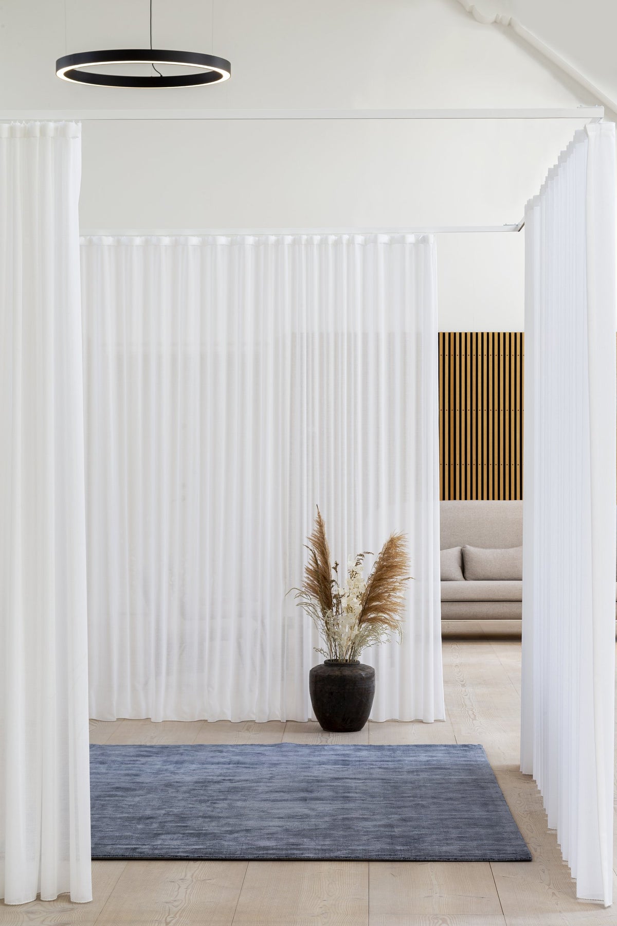 Massimo Karma Washed Blue bamboo silk rug, shown in an interior