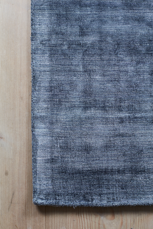 Massimo Karma Washed Blue bamboo silk rug, detail of the corner