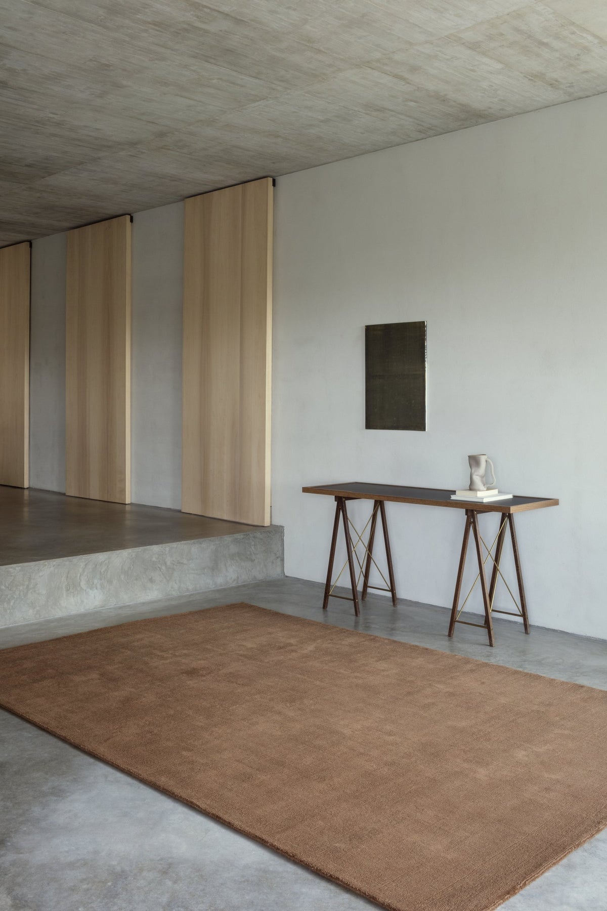 Massimo Karma Wool Dark Oak cognac rug, shown in an interior