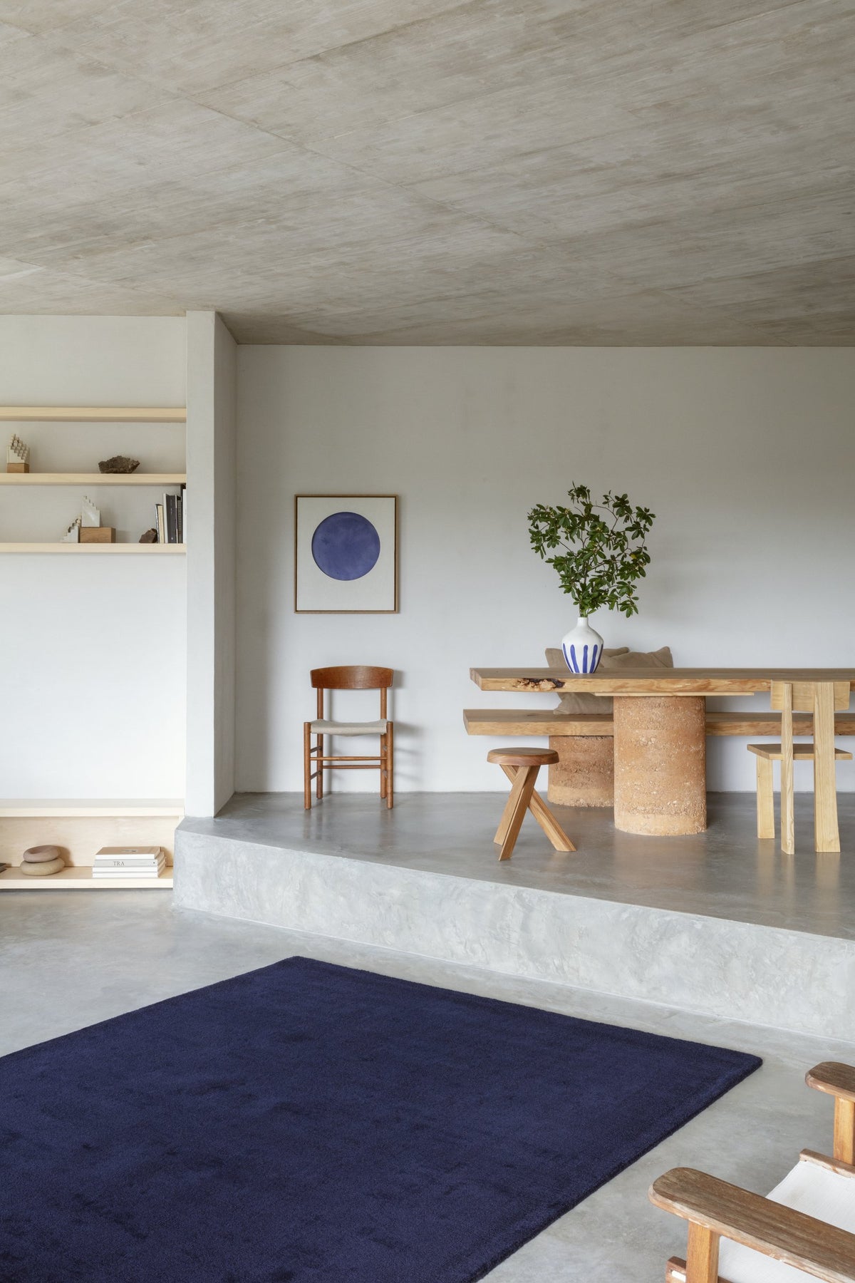 Massimo Karma Wool Marine navy blue rug, shown in an interior