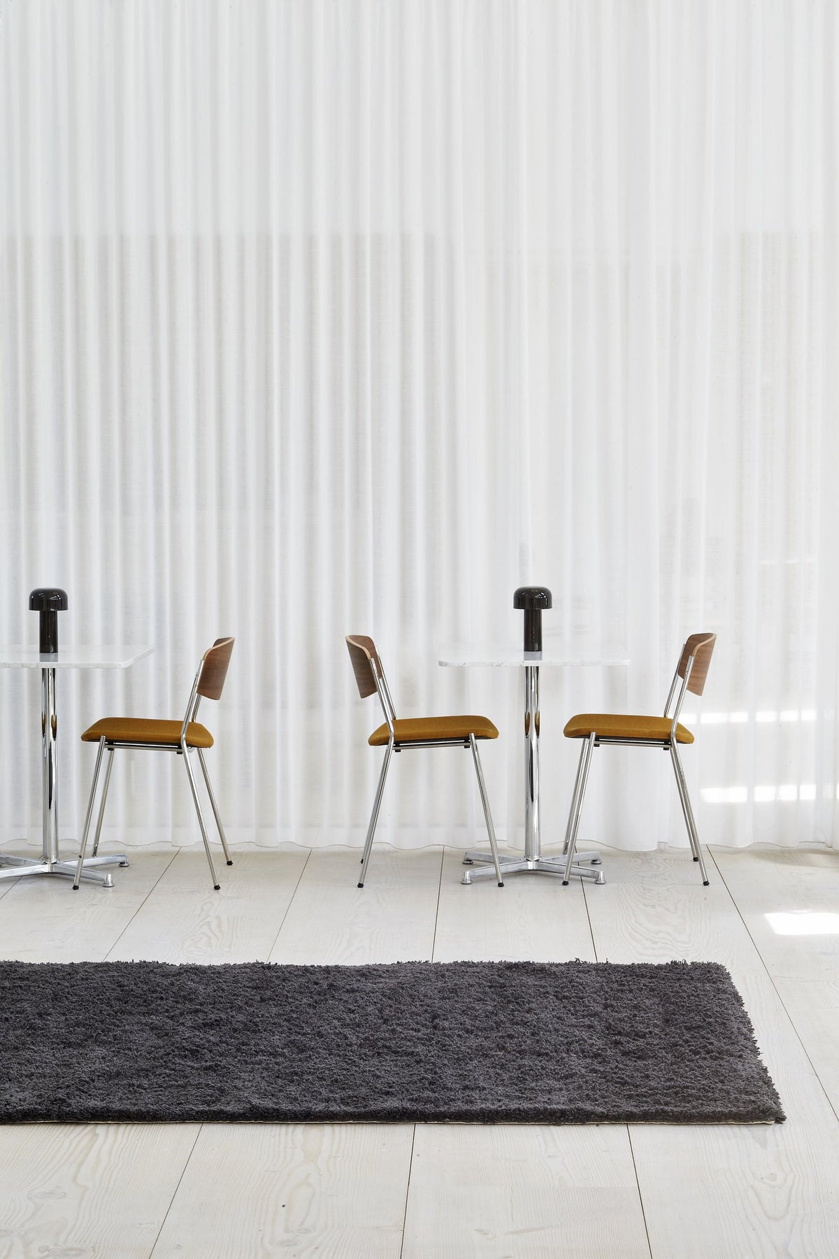 Massimo Rya Charcoal high pile wool rug, shown in an interior