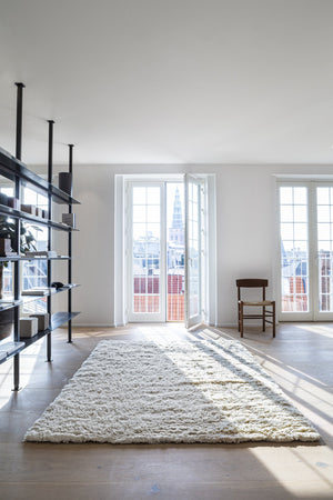 Massimo Rya Cream high pile wool rug, shown in an interior
