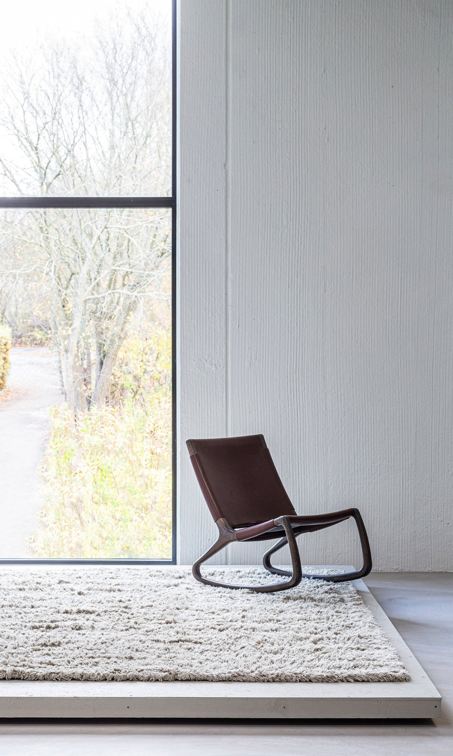 Massimo Rya Soft Beige high pile wool rug, shown in an interior