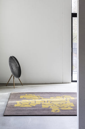 Massimo Structures Fragment 1 yellow rug, styled in a bright room