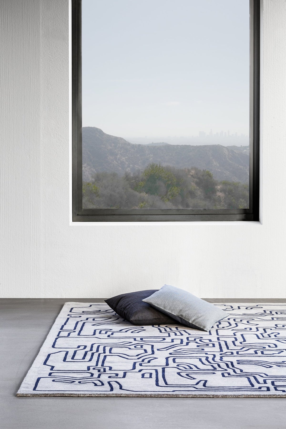 Massimo Structures Fragment 2 blue wool rug, shown in an interior