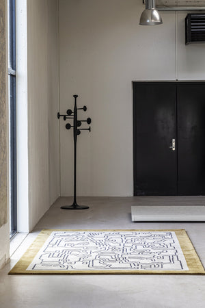Massimo Structures Fragment 2 Border rug, shown in an interior