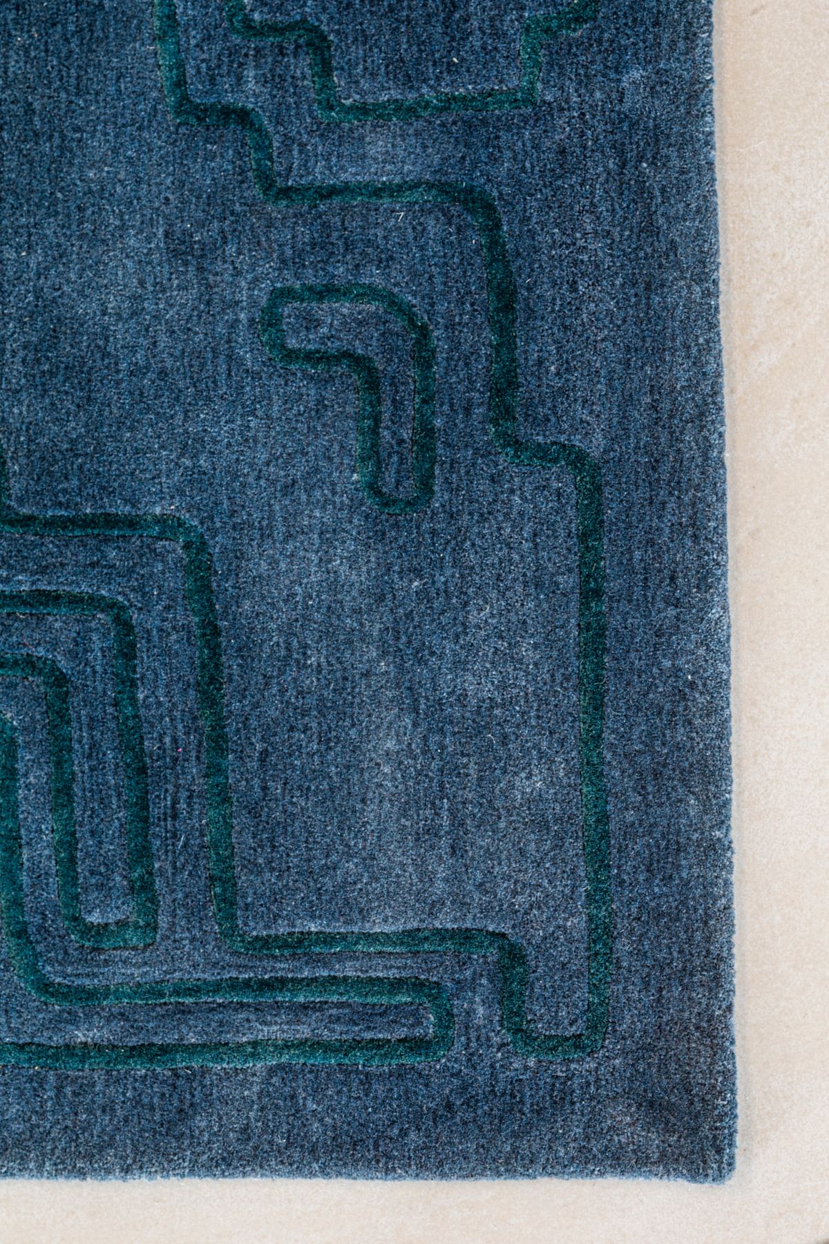 Massimo Structures Fragment 4 blue wool rug, detail of the corner