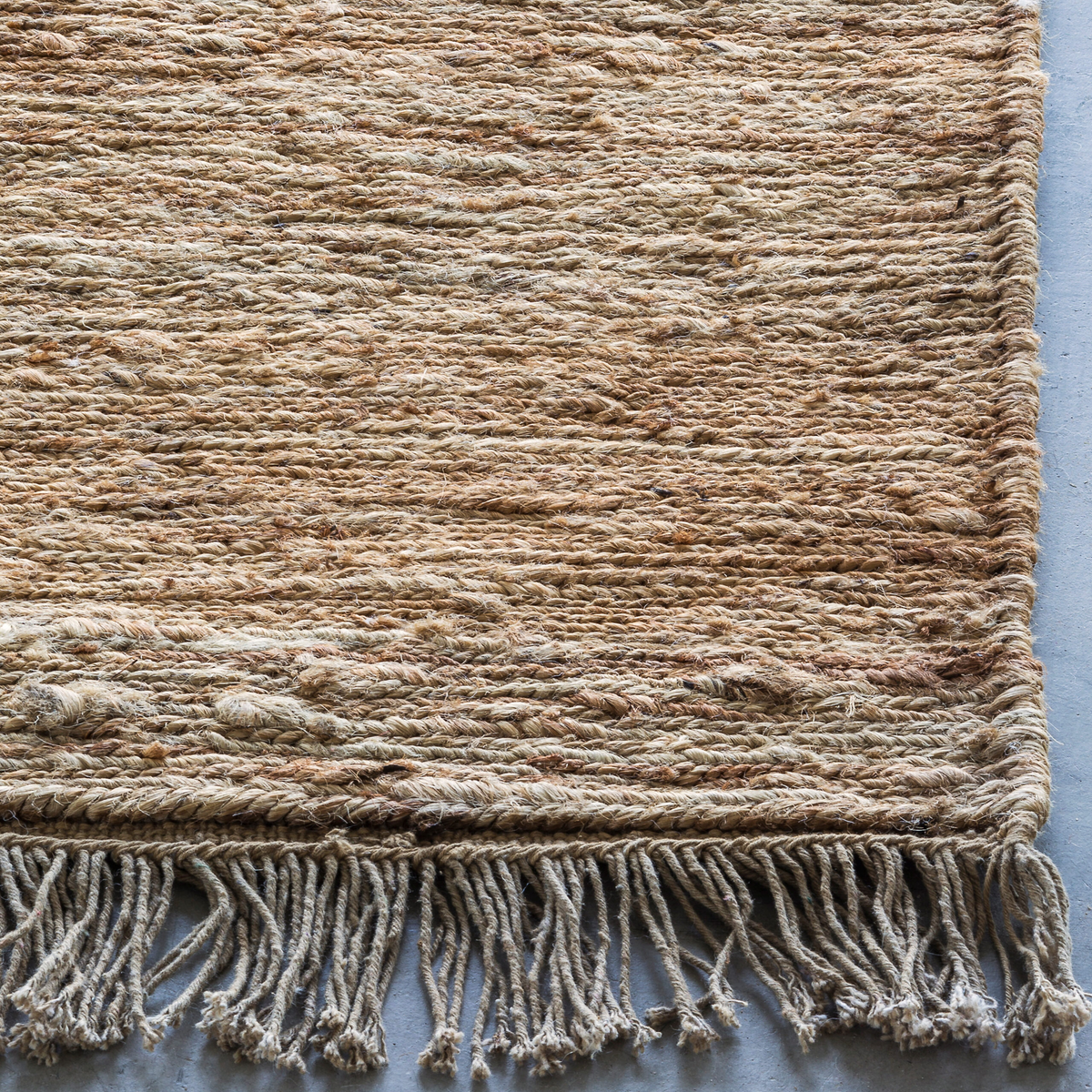 Massimo Sumace Natural fringed jute rug, detail of the fringes